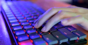 a person typing on a computer