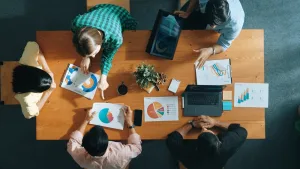 group round a table for marketing
