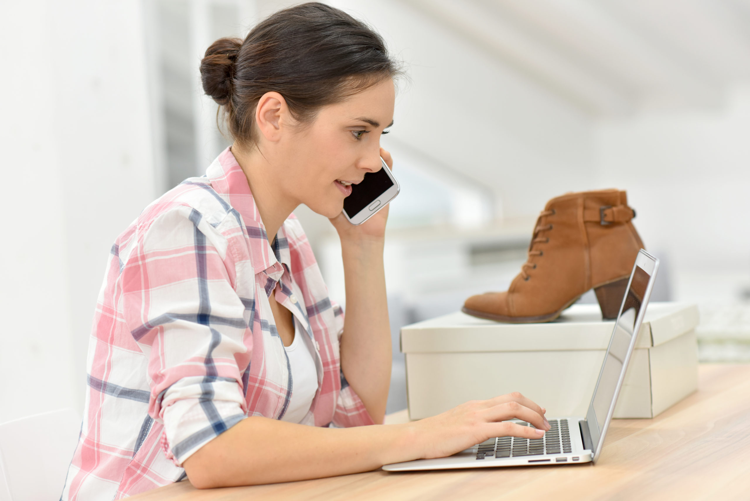 women on the phone with customer service