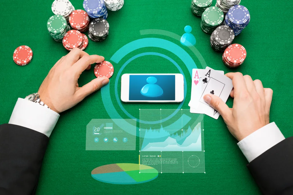 Online casino play on a smartphone at a card table