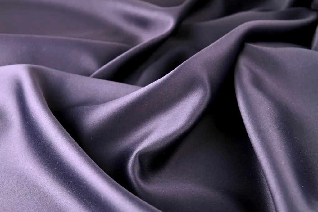 Silk fabric, an abstract stand-in chosen because the product imagery is explicit