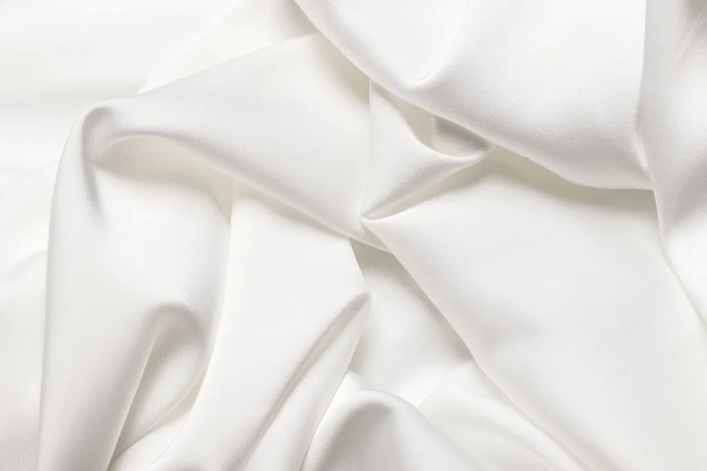 Silk and soft furnishings, an abstract stand-in chosen because the product imagery is explicit