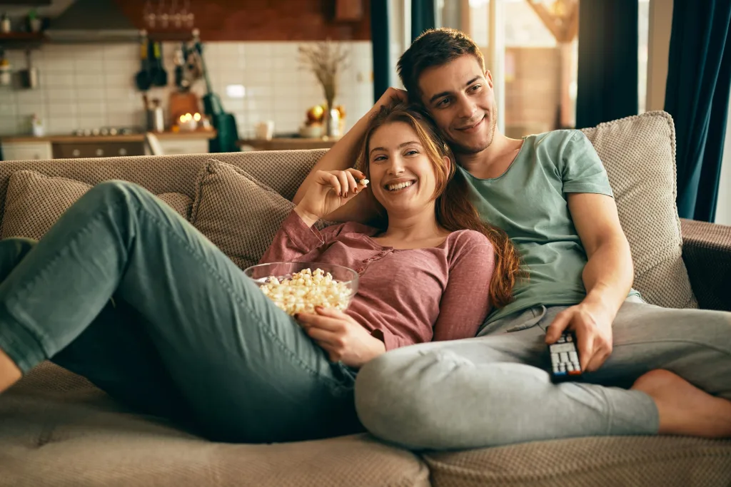 Couples relaxing together at home