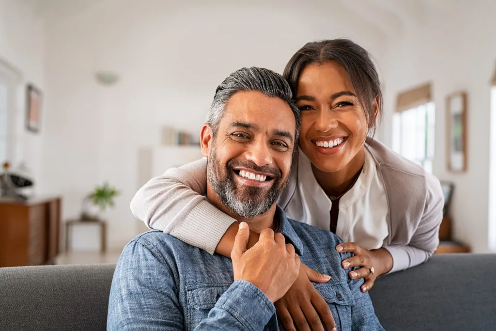 Couples relaxing together at home