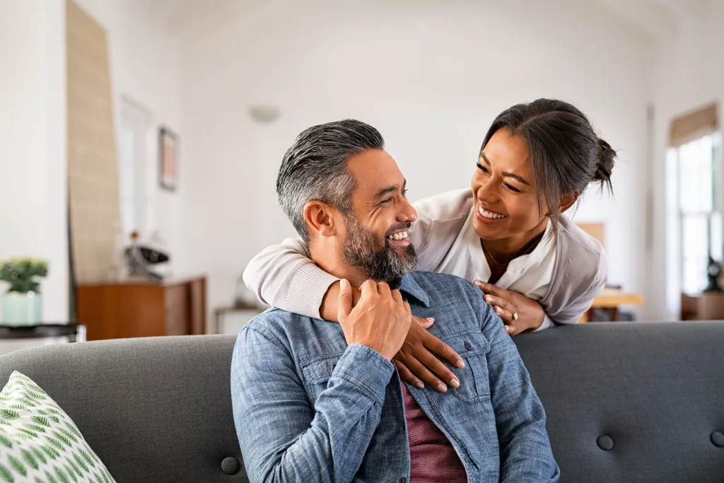 Couples relaxing together at home