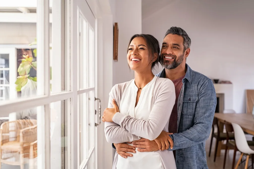 Couples relaxing together at home