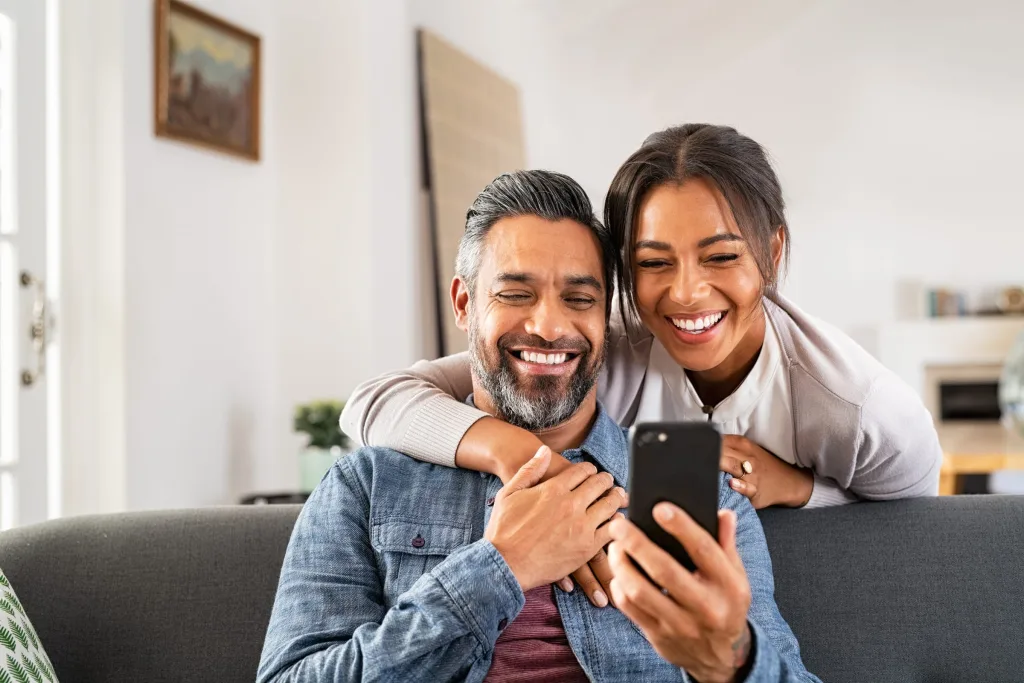Couples relaxing together at home